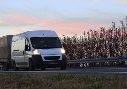 Van pulling a trailer